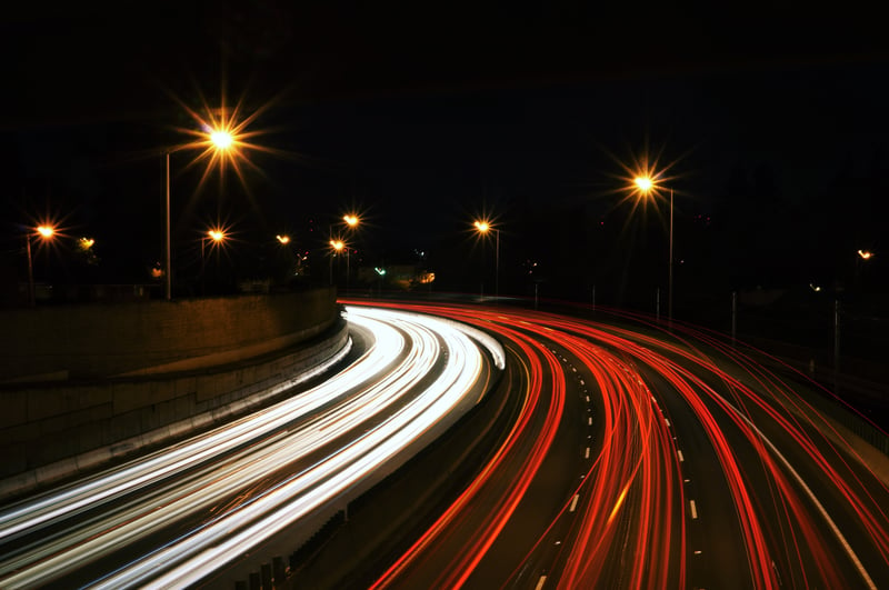 Fast moving car lights on the road